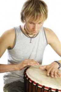 teenage boy on tom tom drums